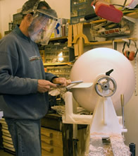 Joe Feinblatt turning lamp at lathe